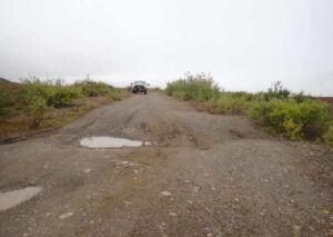 Photo courtesy of Simon Zwieback
This access road near Toolik Field Station on Alaska’s North Slope shows the effect of ground subsidence.