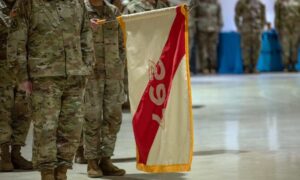 Photo By Staff Sgt. Seth LaCount | Alaska Army National Guardsmen assigned to the 297th Regional Support Group present the unit colors during the playing of the national anthem at a deployment ceremony at the Alaska National Guard Armory on Joint Base Elmendorf-Richardson, Jan. 24, 2025. The Alaska Army National Guard’s Headquarters and Headquarters Company, 297th RSG will deploy approximately 80 Guardsmen on a nine-month mission to Eastern Europe in support of the U.S. Army Europe and Africa’s Operation European Assure, Deter and Reinforce. (Alaska National Guard photo by Staff Sgt. Seth LaCount)