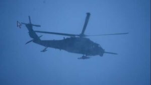 A 210th Rescue Squadron Detachment 1 HH-60G Pave Hawk combat search and rescue helicopter departs Eielson Air Force Base, Alaska, Dec. 12, 2024. Detachment 1 comprises a command element permanently stationed at Eielson AFB and 210th RQS Guard members rotating from Joint Base Elmendorf-Richardson to support operations. (Alaska Air National Guard photo by Senior Airman Joseph Moon)