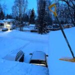 Photo by Jennifer Schmidt Shoveling snow from roofs, like this one in Anchorage, is a safety measure in heavy snow loads.