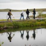 Photo by Erin Towns A group tours long-term research sites near Toolik Field Station in Arctic Alaska in August 2025.