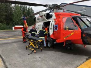 A Coast Guard Air Station Kodiak MH-60 Jayhawk aircrew medevaced a 51-year-old man from the fishing vessel Devotion 34 miles southwest of Cordova, Aug. 4. The man reportedly sustained a head injury then subsequently fell and needed a medevac to receive higher level medical care. U.S. Coast Guard photo.