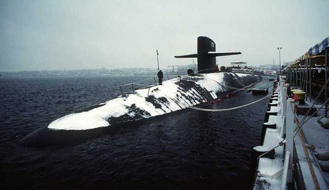 A port bow view of the nuclear-powered strategic missile submarine Alaska (SSBN-732) during its commissioning, 25 January 1986. Official USN photo # DN-ST-86-03676 by PH3 Zoph, courtesy of dodmedia.osd.mil.
